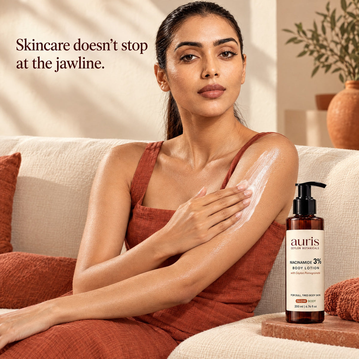 Auris GLOW Niacinamide 3% Body Lotion: worn in a warm editorial portrait