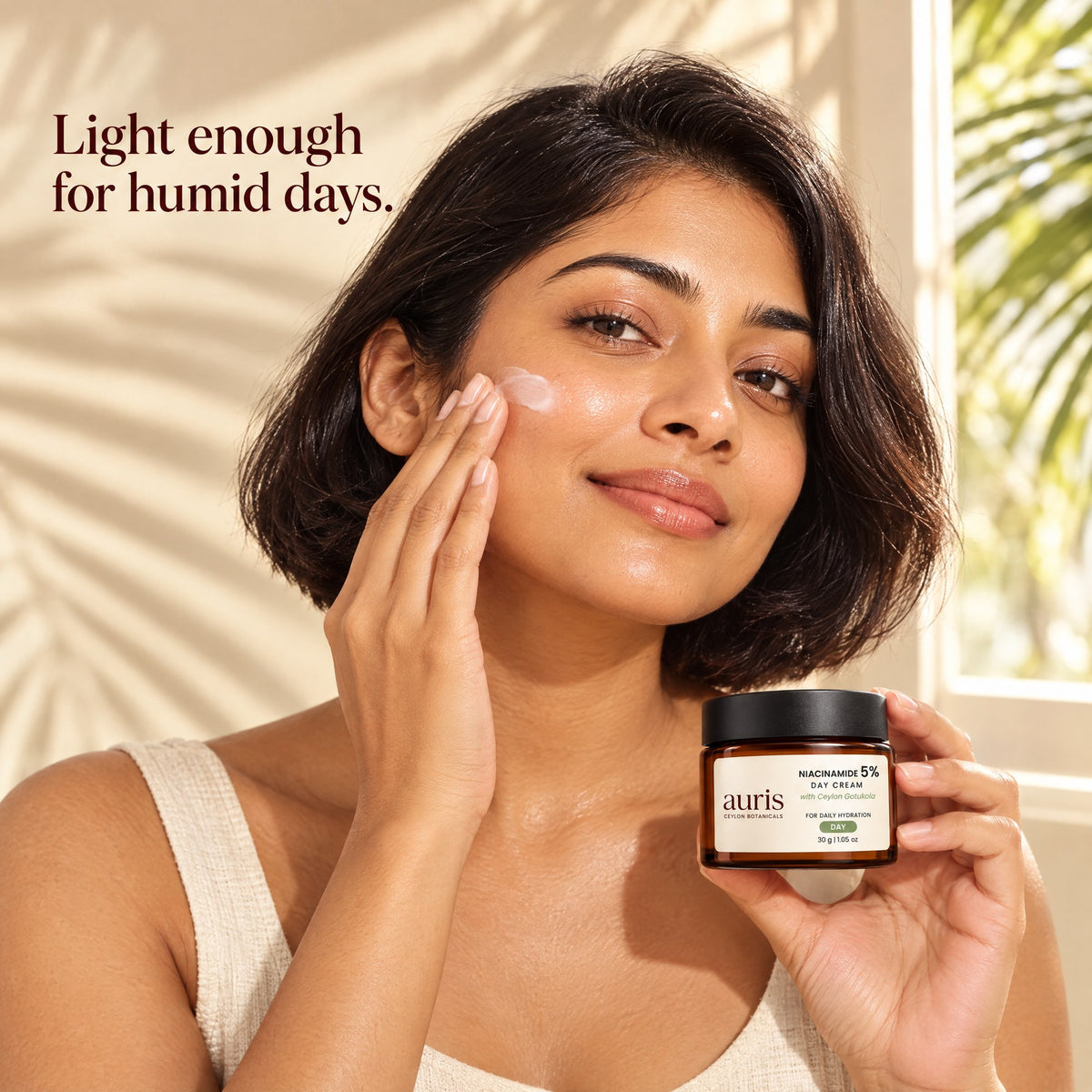 OLD (restored for review) — Auris Niacinamide 5% Day Cream: worn in a warm editorial portrait