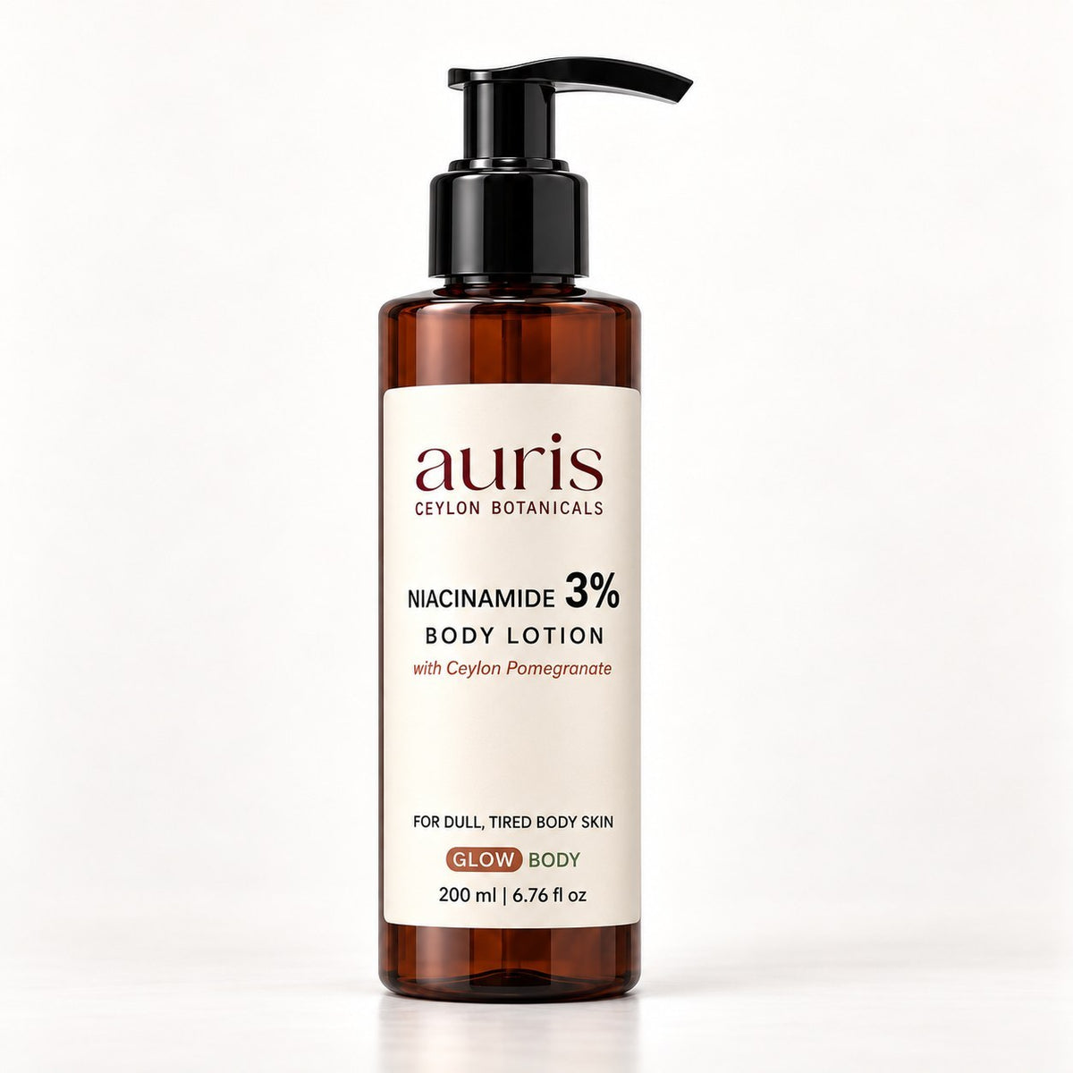 OLD (restored for review) — Auris GLOW Niacinamide 3% Body Lotion with Ceylon Pomegranate, 200 ml amber pump bottle on a white background
