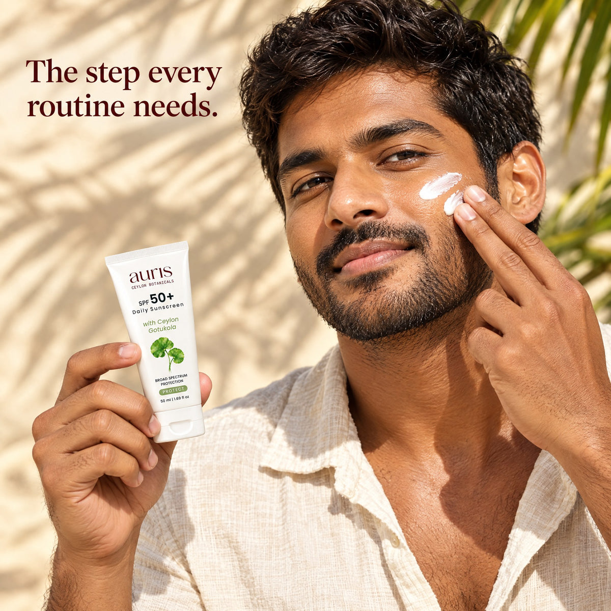 OLD (restored for review) — Auris SPF 50+ Daily Sunscreen: worn in a warm editorial portrait